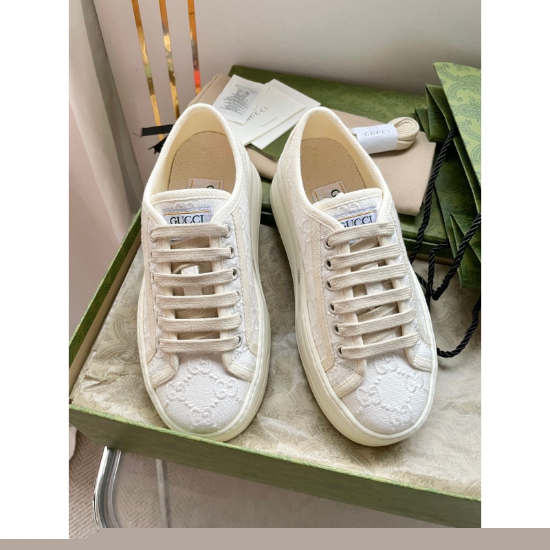 G*u*i sneakers